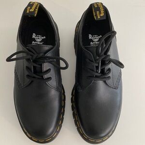 Dr. Martens lace up platform loafers